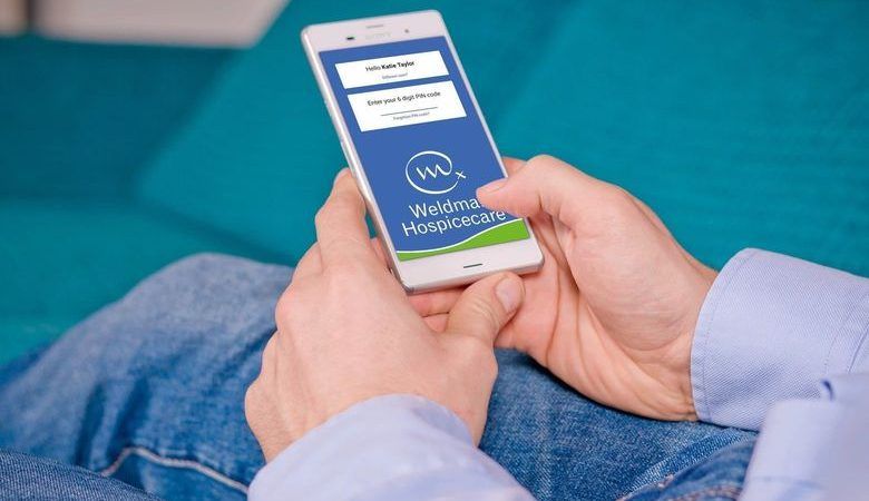 Logging into Weldmar Hospicecare app on a smartphone